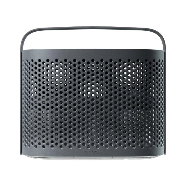 Gray perforated container with a handle on a white background