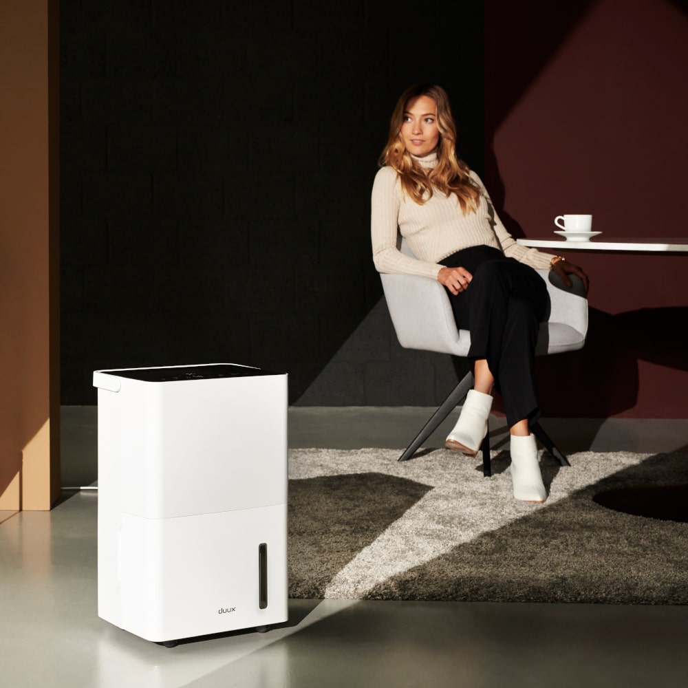 Duux Bora Smart Air Dehumidifier Wi-Fi Enabled Refrigerant 20LDay on Floor by Table - Aerify