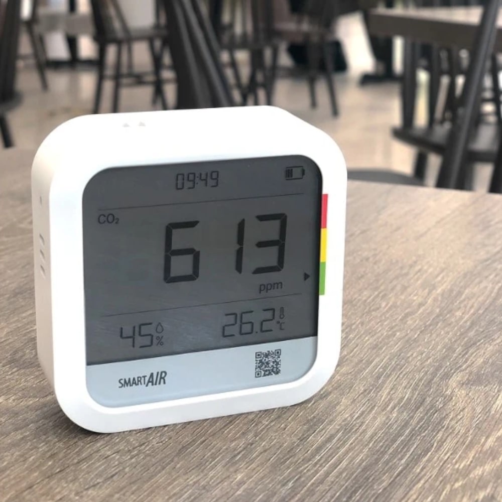 Smart Air 3-in-1 CO₂, Relative Humidity, and Temperature Monitor On Table Restaurant - Aerify