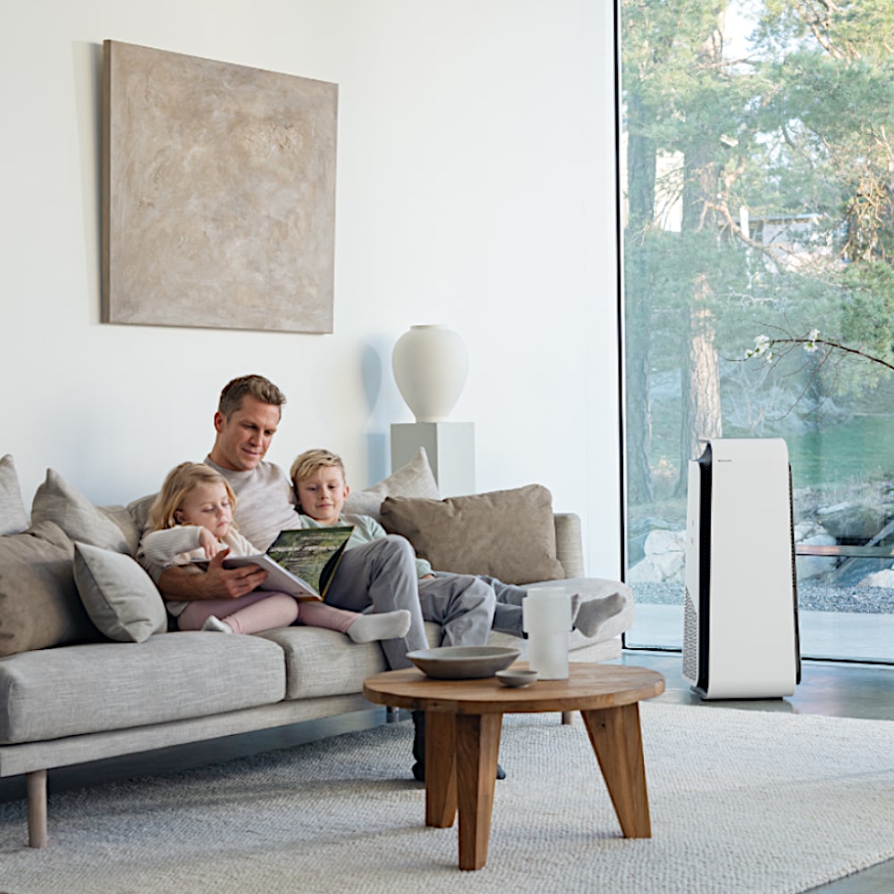 Blueair HealthProtect™ 7740i Air Purifier With Family In Living Room - Aerify