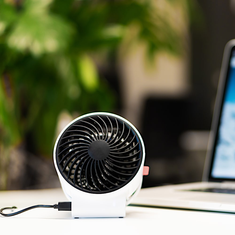 Boneco F50 USB Personal Air Shower Fan On Work desk - Aerify