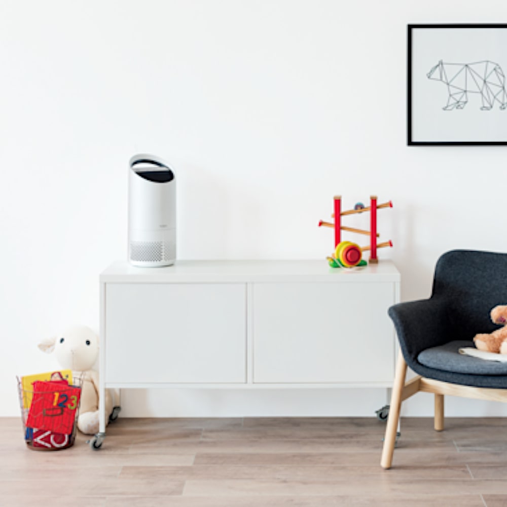 Leitz TruSens Z-1000 HEPA Carbon UV Air Purifier In Living Room On Table - Aerify
